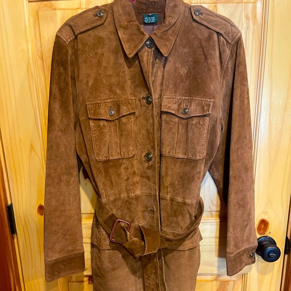 This is a Suede Leather jacket size Medium.  Gently worn Beautiful jacket.